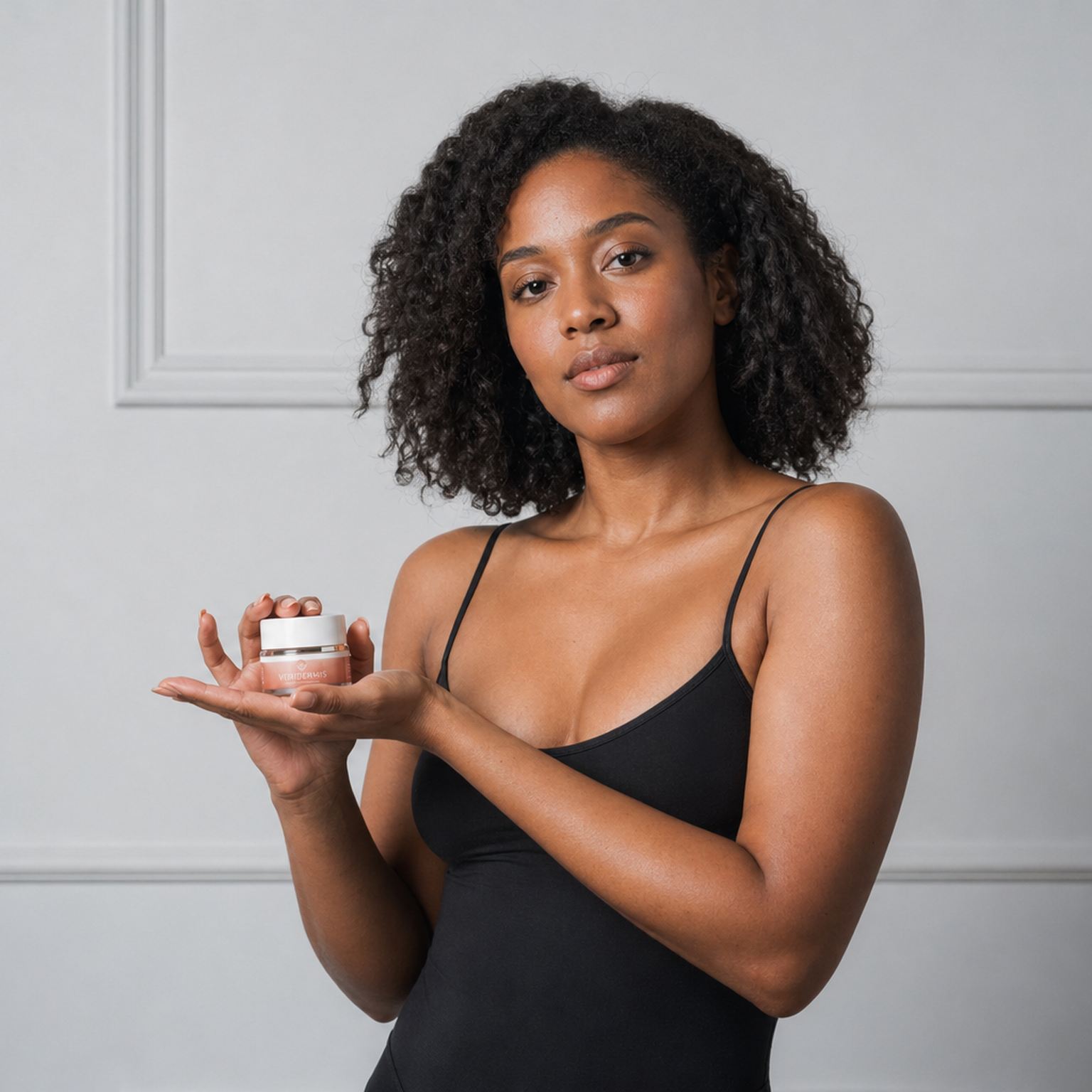 Centella Face Cream with model with shoulder-length curly hair